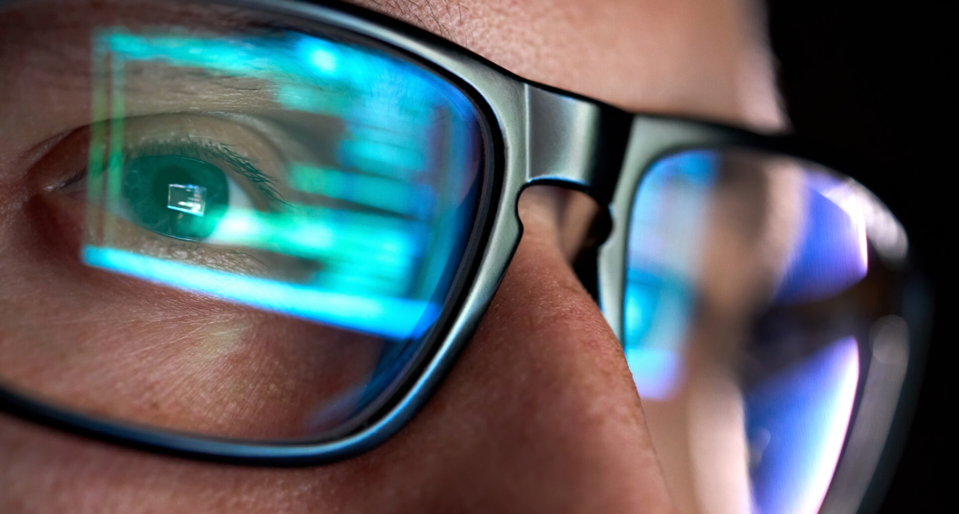 Focused,Developer,Coder,Wears,Glasses,Working,On,Computer,Looking,At